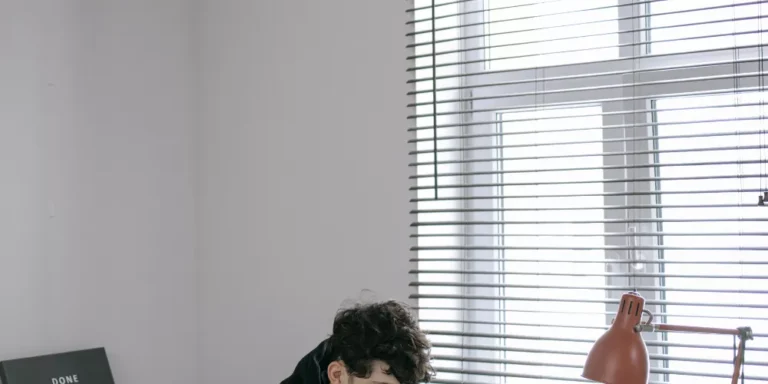 How do I plan a stairwell chandelier installation